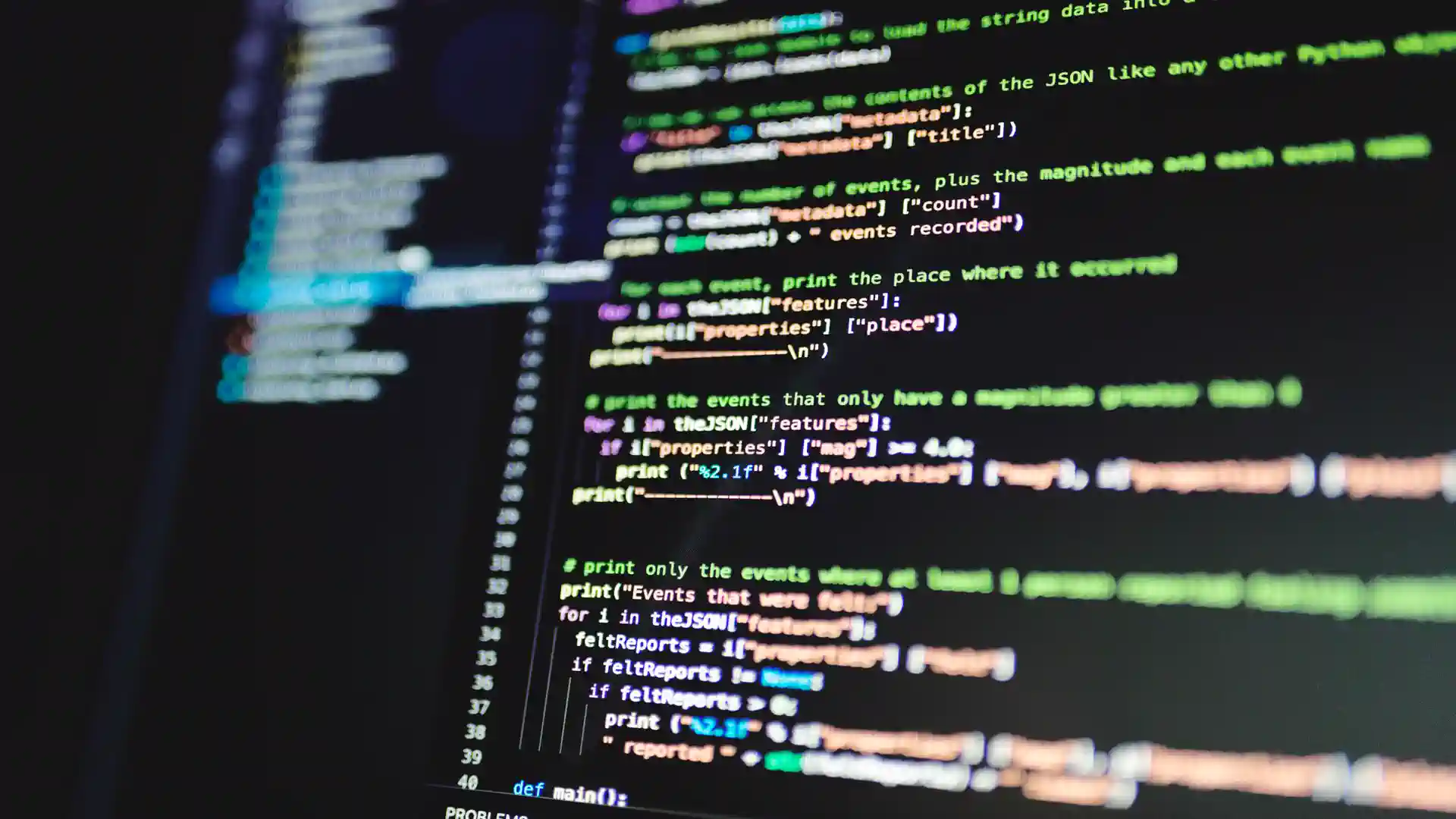 Cursor AI review — real photo of a close-up of Python code on a dark screen