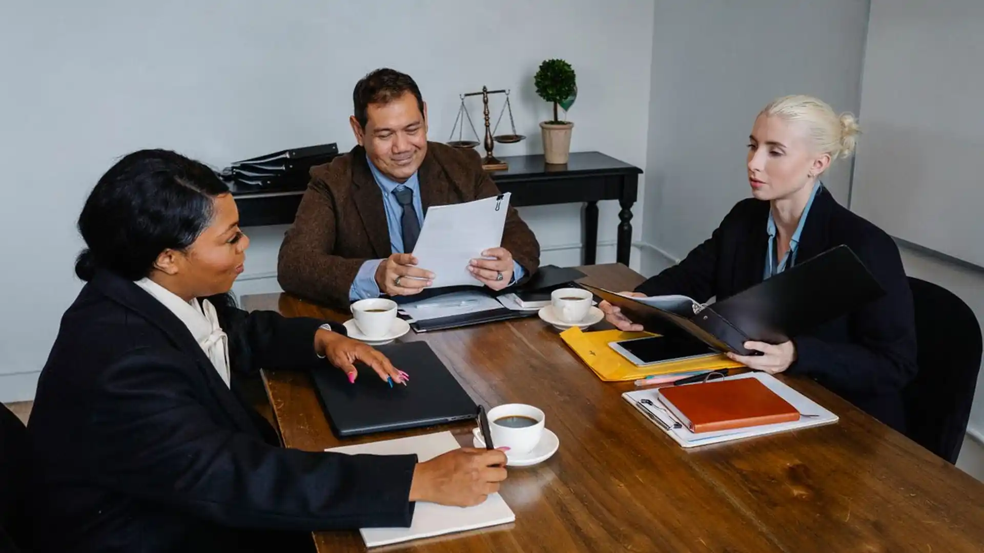 Business team collaborating around a table in a modern office