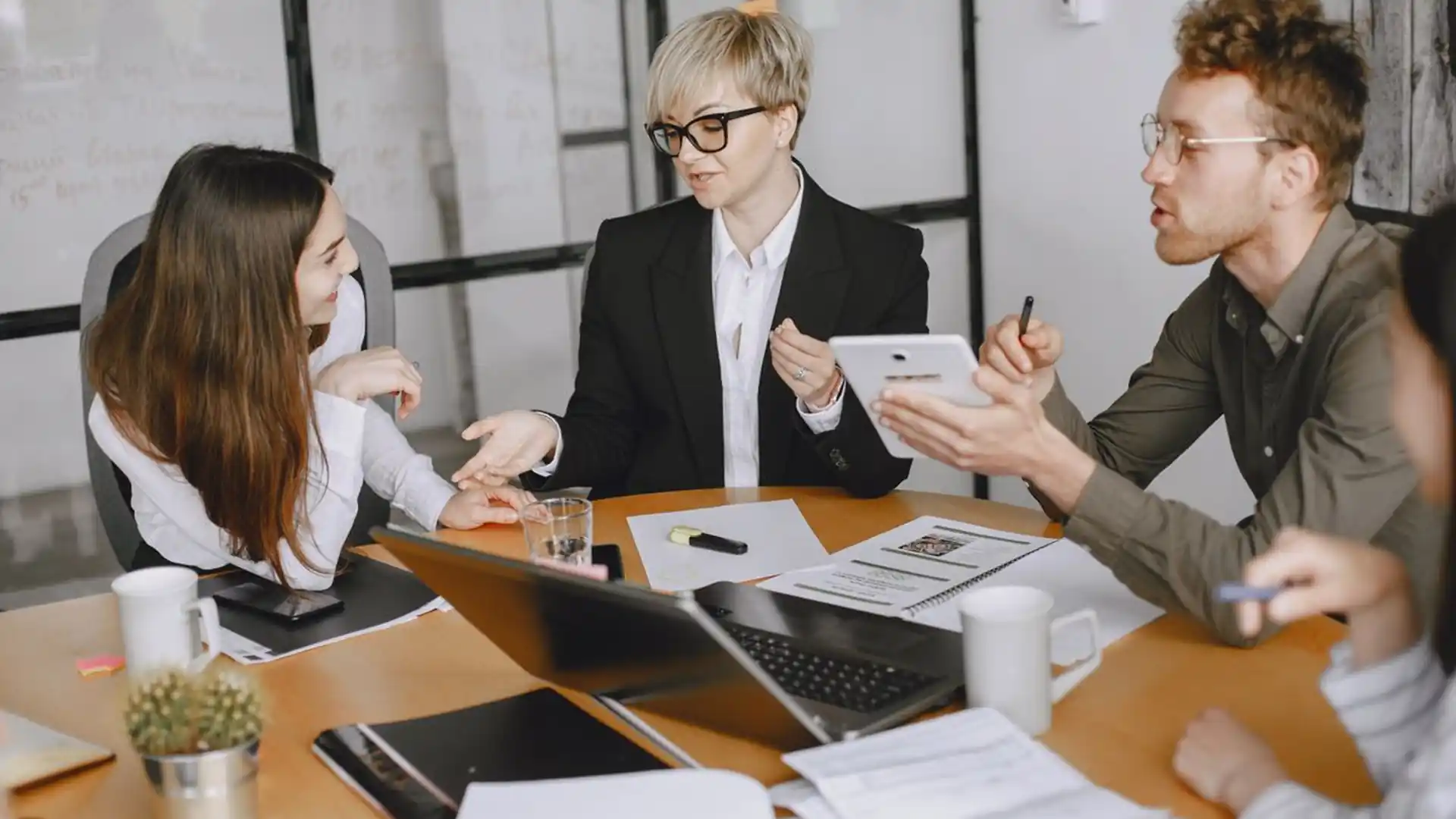 Business team collaborating around a table in a modern office