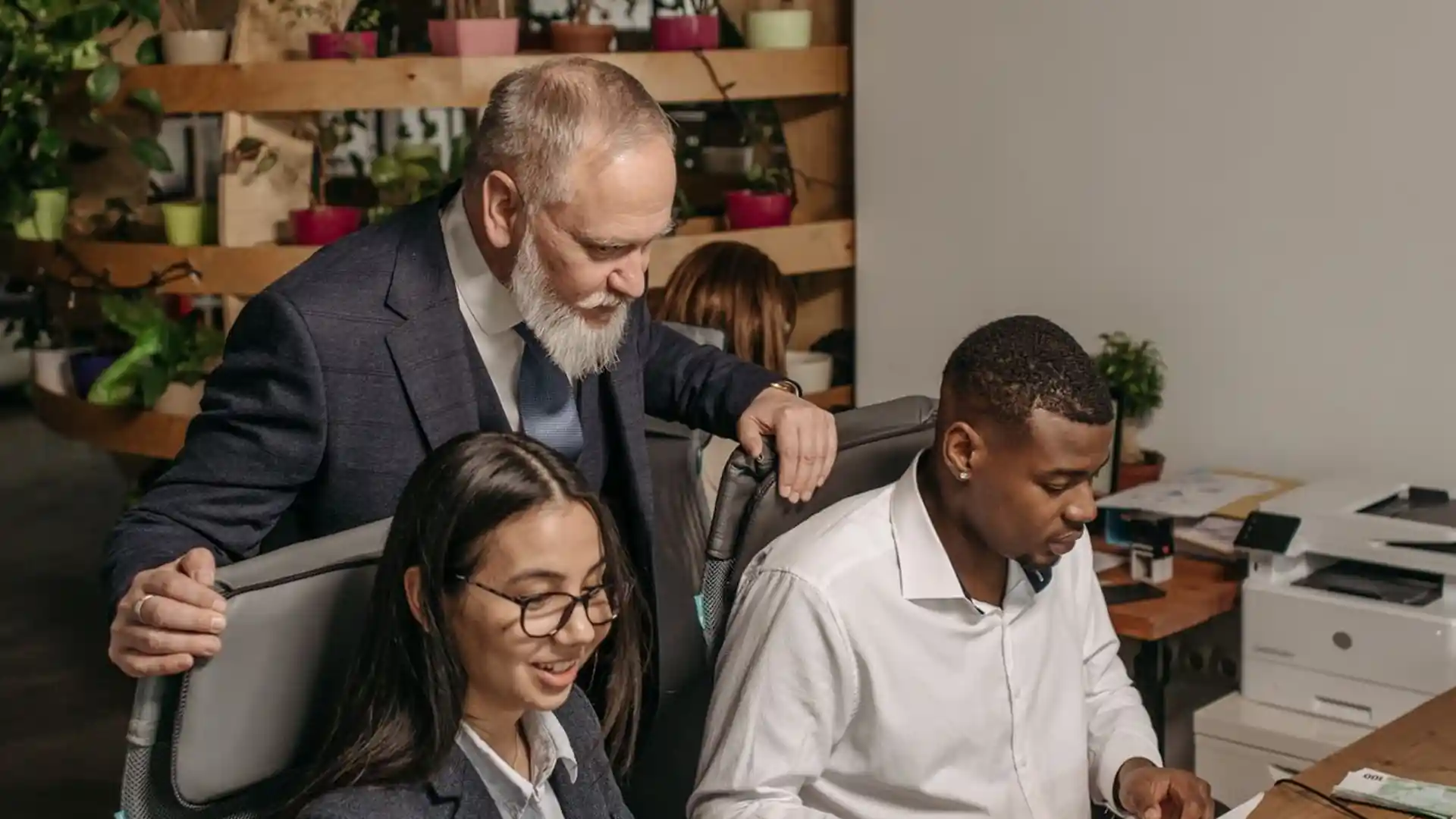Business team collaborating around a table in a modern office