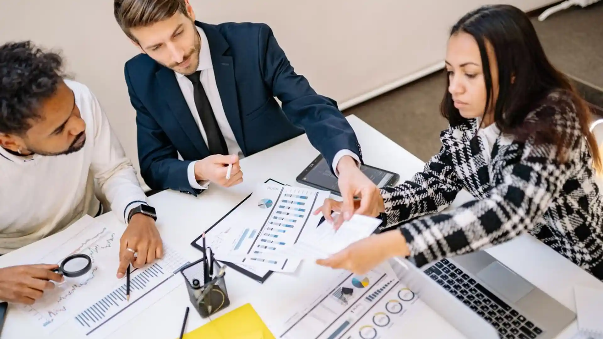 Business team collaborating around a table in a modern office