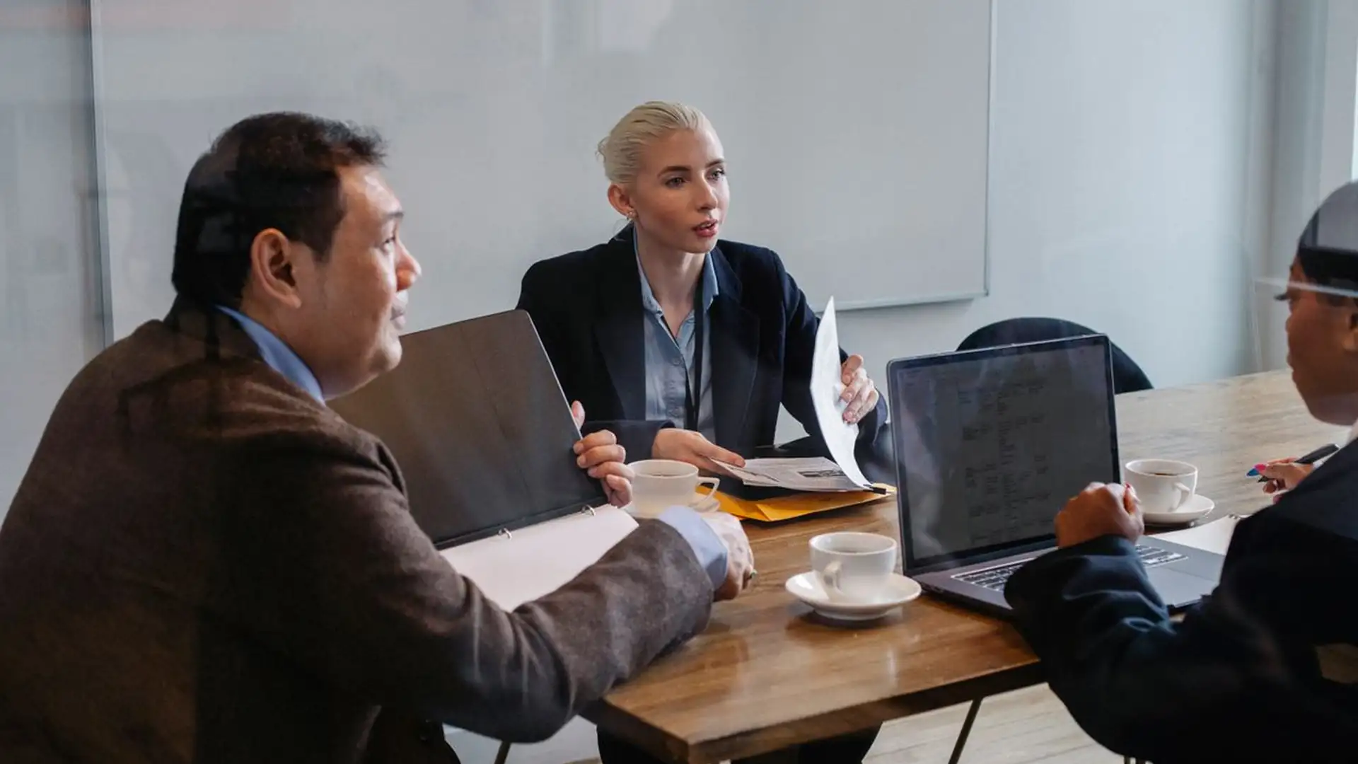 Business team collaborating around a table in a modern office