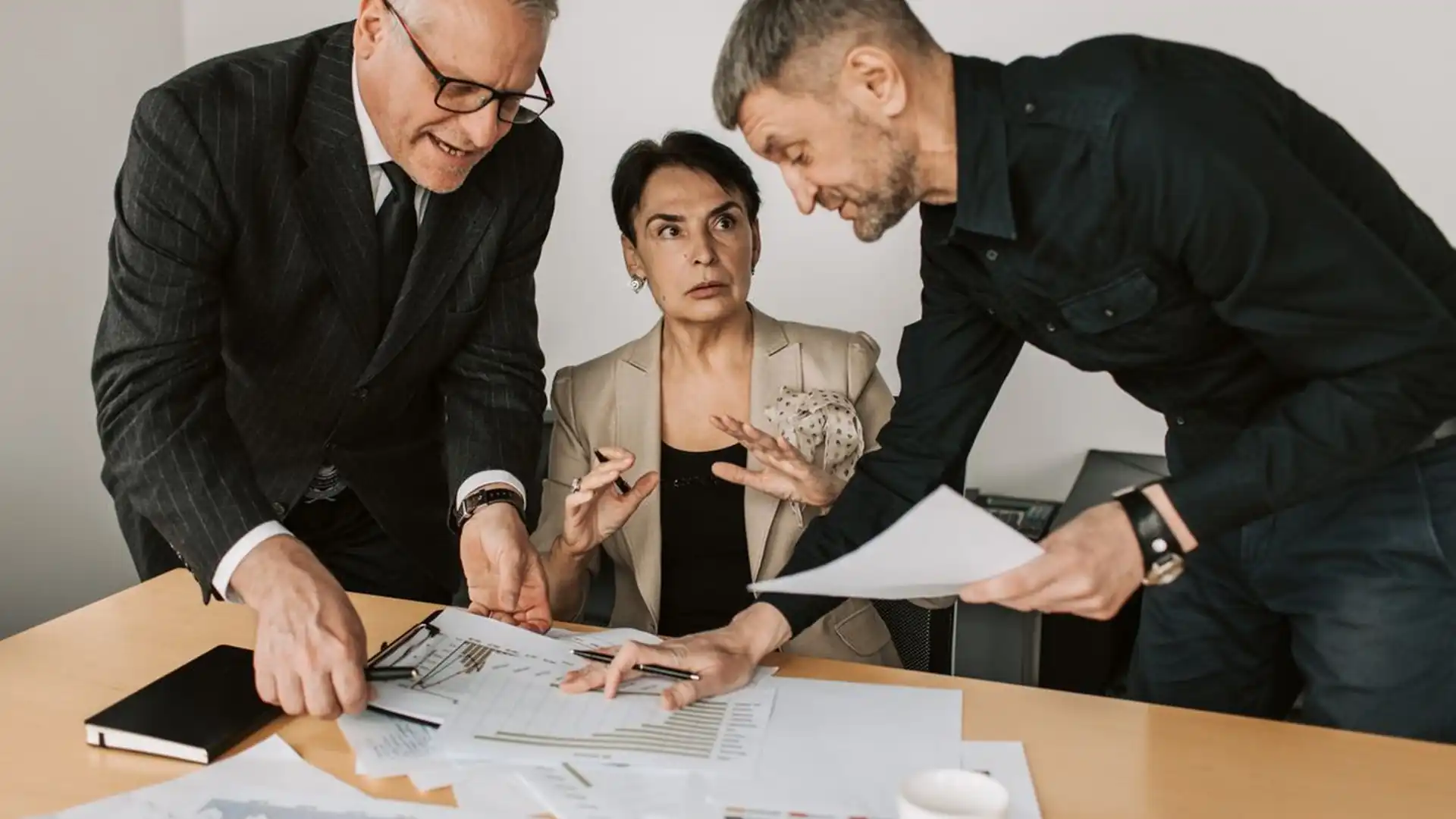 Business team collaborating around a table in a modern office