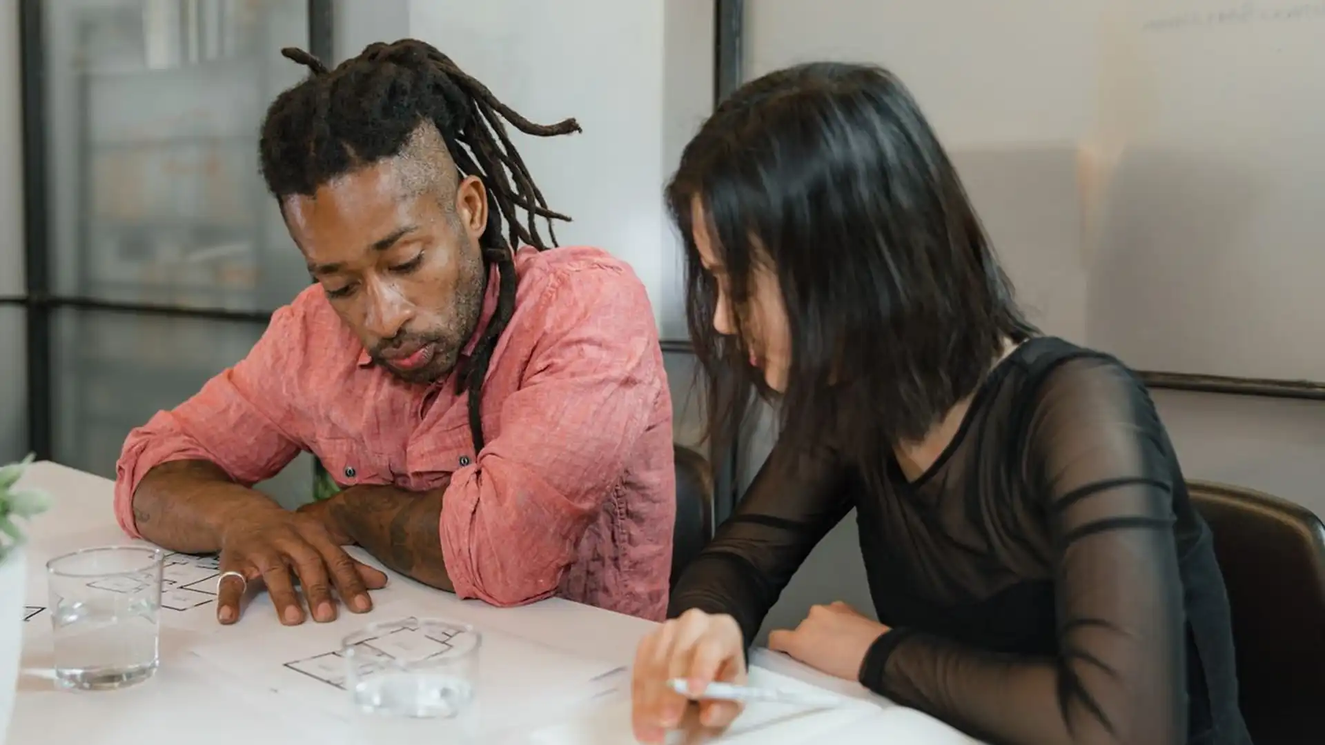 Business team collaborating around a table in a modern office