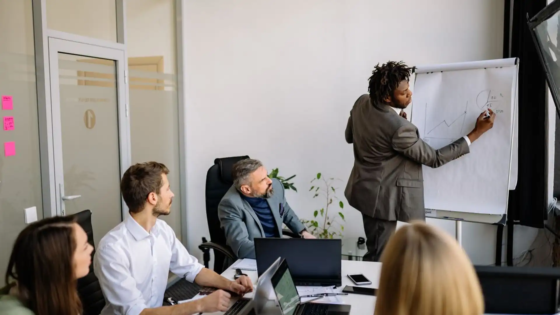 Business team collaborating around a table in a modern office