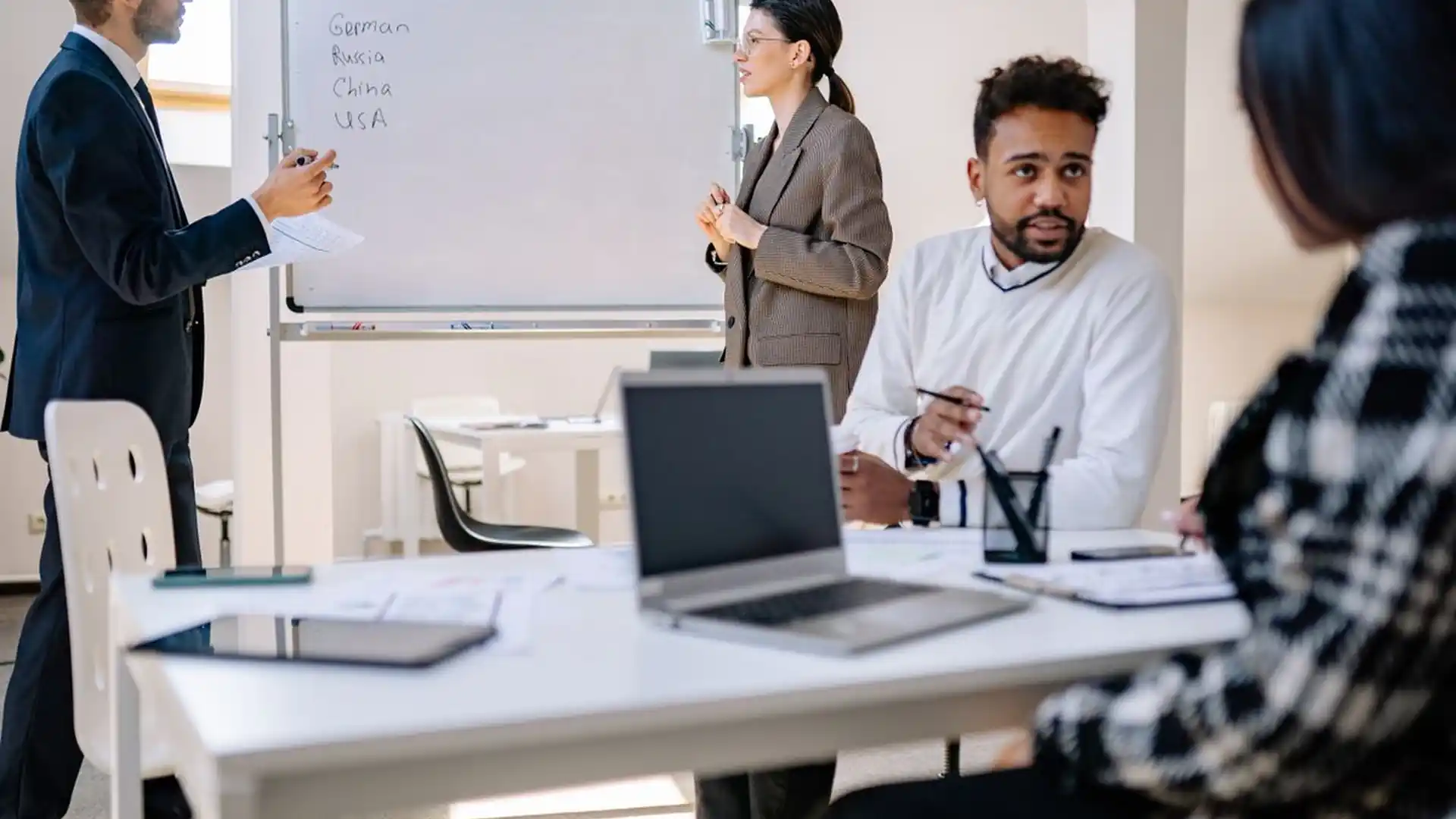 Business team collaborating around a table in a modern office