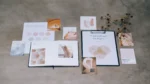 Consistent brand images with AI image generator — real photo of a flat lay of brand strategy boards and color swatches