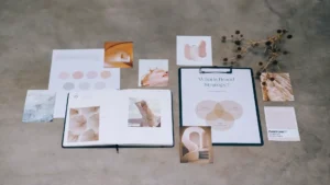 Consistent brand images with AI image generator — real photo of a flat lay of brand strategy boards and color swatches