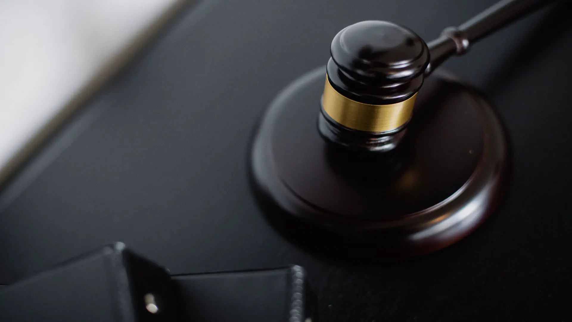 AI regulation update — real photo of a judge's gavel resting on a sound block