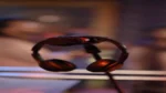 Best AI voice changer tools — real photo of headphones resting on a stand