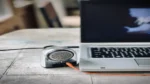 AI text to speech tools — real photo of a small speaker connected to a laptop