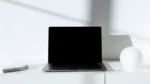 AI tools for affiliate marketing — real photo of a laptop on a bright minimal white desk