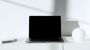 AI tools for affiliate marketing — real photo of a laptop on a bright minimal white desk